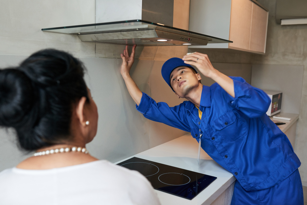 Hood Fan Installation In Ottawa Honest Guys Appliance Repair   Man Installing Cooker Hood 